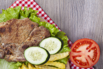 Meat grilled with salad