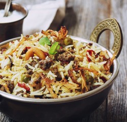 Keema /  Kheema  Biryani -Basmati rice cooked with minced meat and aromatic spices, selective focus