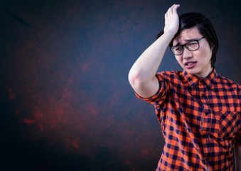 Upset disappointed man against blue background