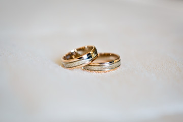 Two wedding rings close up. Wedding symbols, attributes. Holiday, celebration. Macro