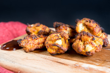 delicious fried chicken wings with sauce