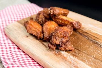 delicious fried chicken wings with sauce