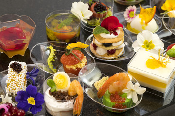Mini canapes with elements of molecular cuisine on stone 