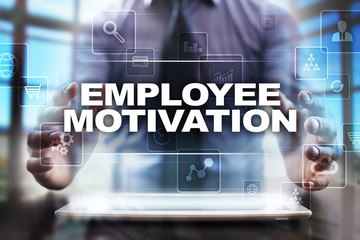Fototapeta na wymiar Businessman using tablet pc and selecting employee motivation.