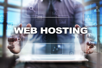 Fototapeta na wymiar Businessman using tablet pc and selecting web hosting.