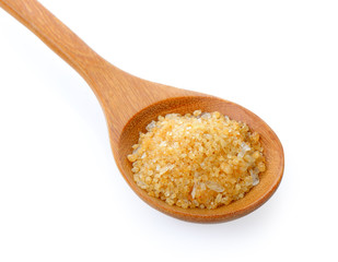 Sugar for coffee in wood spoon on white background