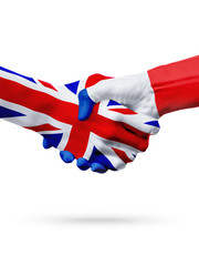 Flags United Kingdom, France countries, partnership friendship handshake concept.