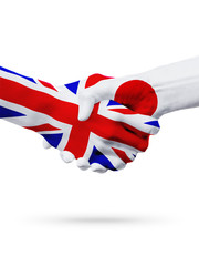 Fototapeta premium Flags United Kingdom, Japan countries, partnership friendship handshake concept.