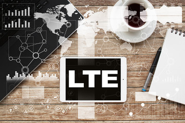 Tablet on desktop with lte text.