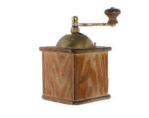 Very old antique coffee grinder with a bronze handle and box for ground coffee on a white...