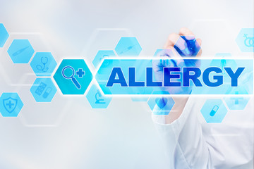 Medical doctor drawing allergy on the virtual screen.