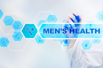 Medical doctor drawing men?s health on the virtual screen.