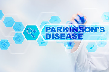 Medical doctor drawing parkinson's disease on the virtual screen.
