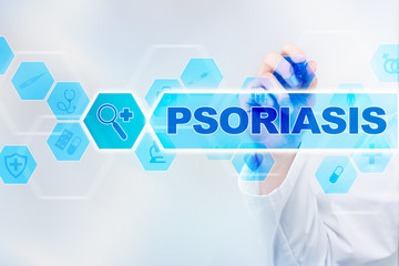 Fototapeta na wymiar Medical doctor drawing psoriasis on the virtual screen.