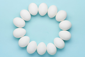 White eggs ring on mint color table