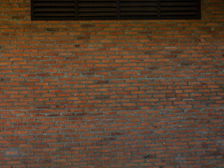 Brick wall and wooden shutters