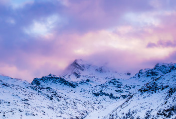 Fototapeta na wymiar Pink sky in the mountains, French Alps