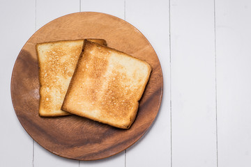 Slice of toast bread on wood table