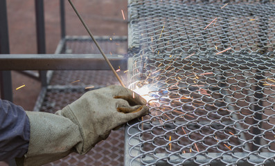 welding a net table with flash light