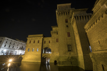 Estense castle or Castello di San Michele in Ferrara, Italy. Night view.