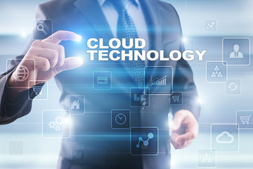Businessman selecting cloud technology on virtual screen.