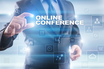 Businessman selecting online conference on virtual screen.