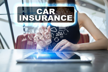Woman using tablet pc and selecting car insurance.