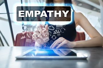 Woman using tablet pc and selecting empathy.