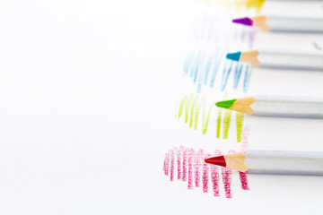 Colorful pencil drawing and pencil on white background
