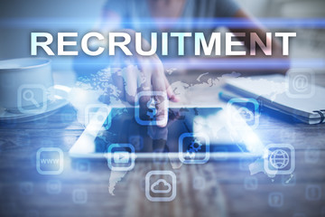 Woman using tablet pc, pressing on virtual screen and selecting recruitment.