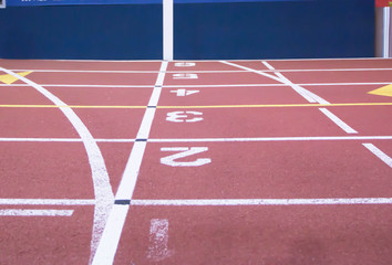 The start and finish line at an indoor track