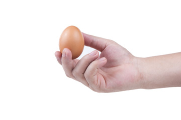 Fresh egg in a hand  isolated in white background