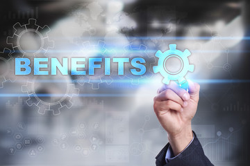 Businessman is drawing on virtual screen. benefits concept.
