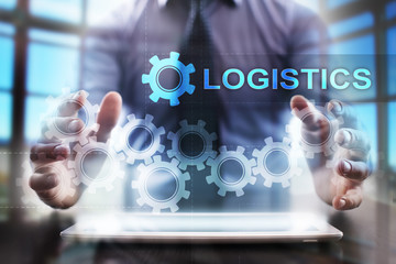 Businessman using tablet pc and selecting logistics.