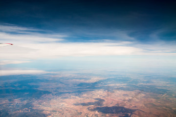 Wing of aeroplane flying in the sky