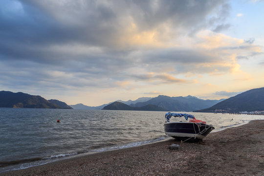 speed boat in marmaris beach with mountains