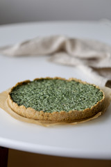 Round pie with spinach and Ricotta cheese. Food background
