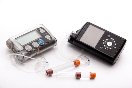 Diabetic items - Diabetes care, concept, test, monitor, background: Education about items to control diabetes: New modern Sensor-Augmented insulin pump, blood sugar meter and glucose sensor with set