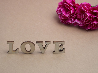 Vintage car carry a  gift box on color background and top wood table for Christmas and The New Year and Valentine's day .Decoration love heart .