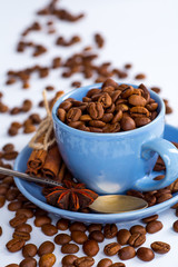 Coffee cup and beans on a white background.