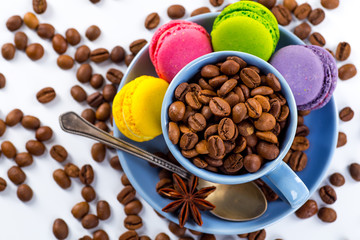 Coffee cup and beans on a white background.