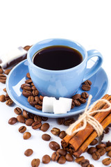 Coffee cup and beans on a white background.