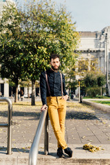young bearded caucasian business man posing outdoor city - customer, business, startupper concept