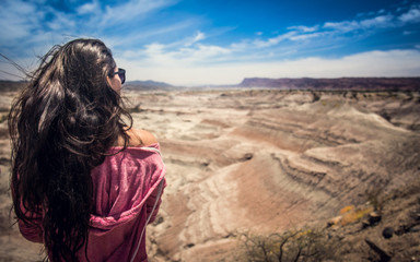 Girl watching desert, Ischigualasto, Argentina