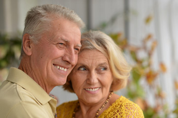 Happy elderly couple embracing