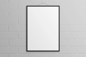 White poster mockup with black frame brick wall