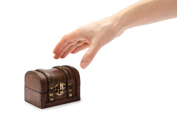 hand of young girl holding glass of rum with coke.