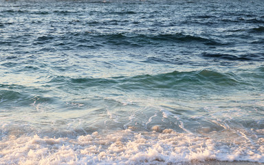 sea water at sunset in a beach of Galicia