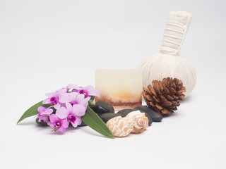 Aromatherapy  product  Spa set ,candle ,soap,coconut orchid flower,shell,  massage  with white wood  background . top view composition.
