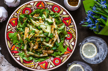 Salad with pear cucumber and avocado and mustard dressing    